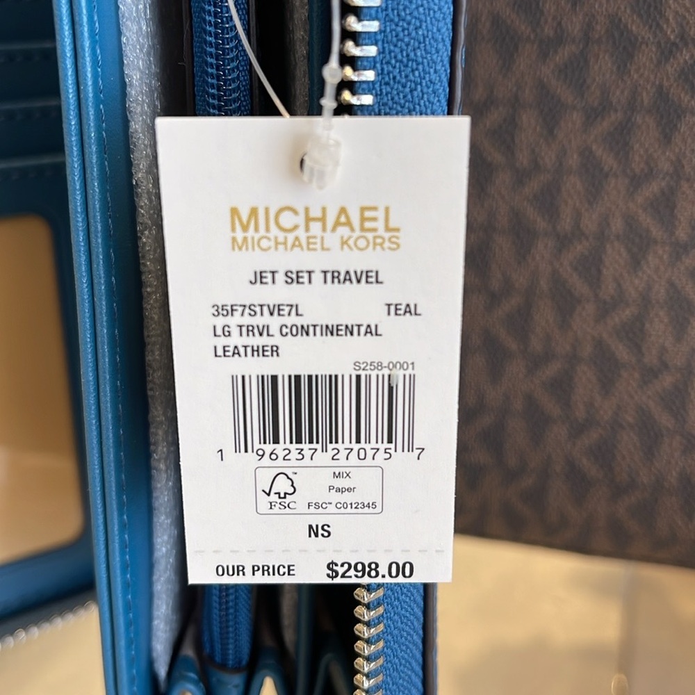 MICHAEL KORS
Leather Continental Wristlet Phone Case Wallet 
Teal
NWT - Picture 9 of 16